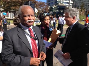 Herman Morris, front, has long been a champion of United Way. Behind hom are Matori Spencer (Loaned Executive) talking to Charlie Maxwell.